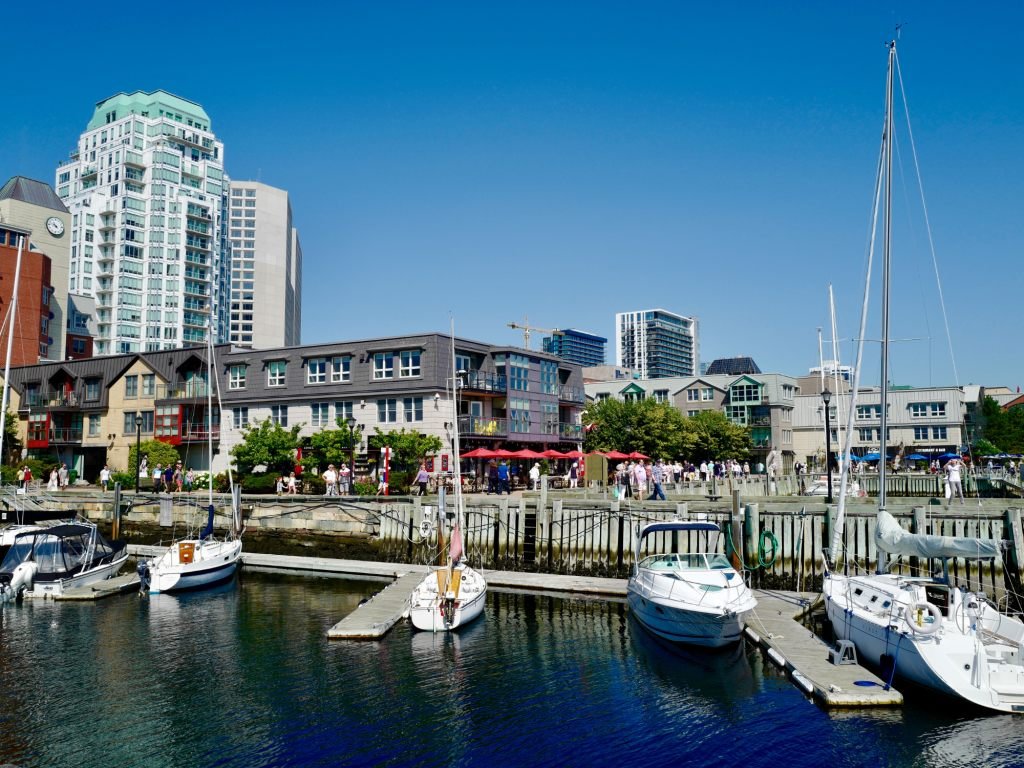 Halifax waterfront boardwalk and marina with downtown towers